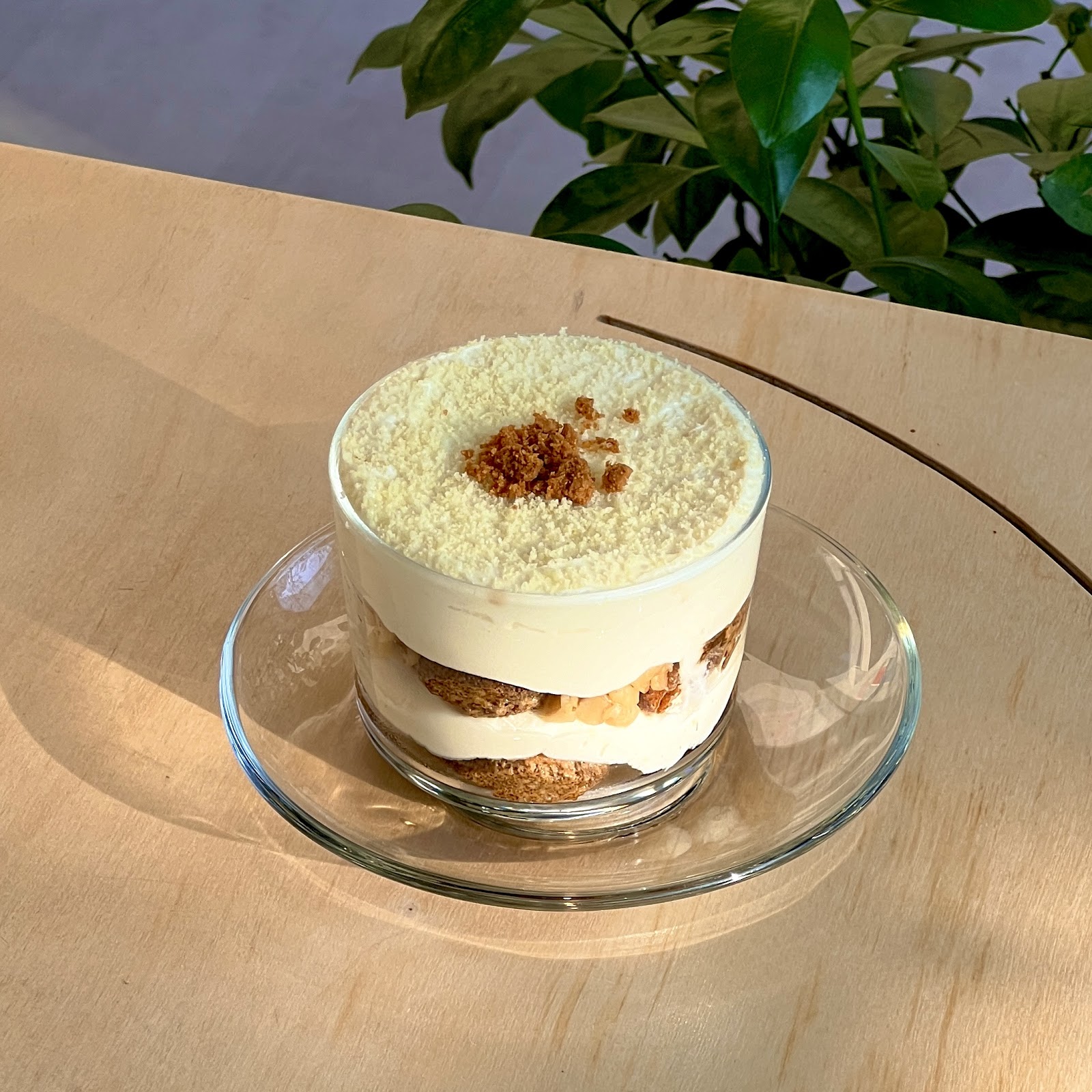 PLAD interior — curated furniture against raw concrete surfaces